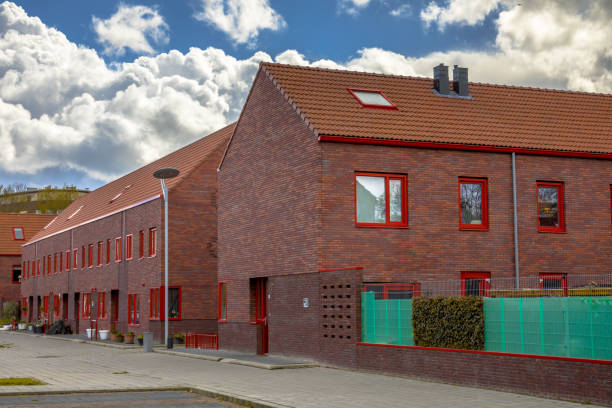 istock Modern neigborhood red brick row houses 1026607424