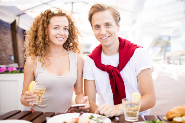 istock Amorous couple in cafe 1026611080