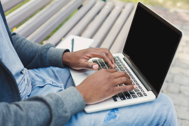 istock Male hands on laptop keyboard, closeup 1026617004