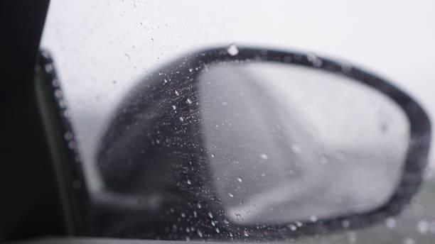 istock Rainy scene automotive rearview mirrors 1026617704