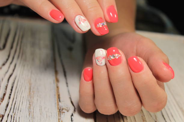 istock glamorous beautiful manicure on a trendy texture background 1026618202