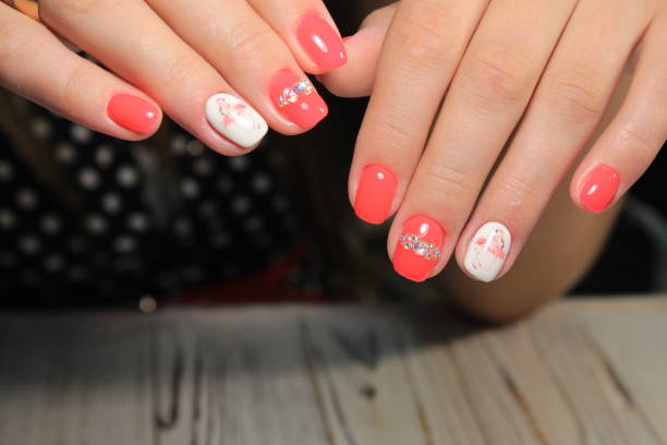istock glamorous beautiful manicure on a trendy texture background 1026618294