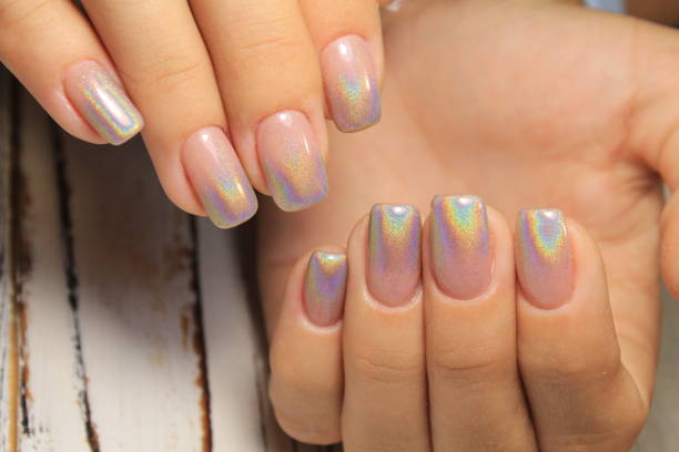 istock Amazing natural nails. Women's hands with clean manicure. 1026620666