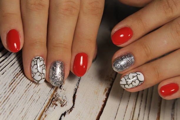 istock Manicured nails colored with red nail polish 1026621340