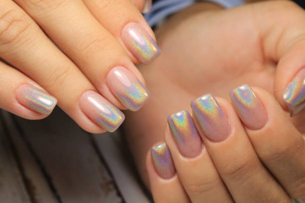 istock glamorous beautiful manicure on a trendy texture background 1026622988