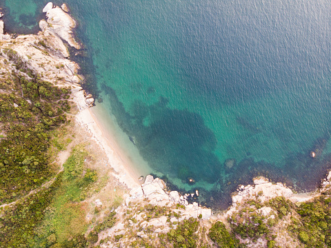 Aerial Drone View of Beach Cove with People Swimming at Erdek Turankoy / Balikesir. Nature in the City.