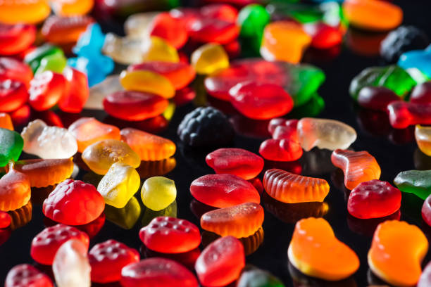 istock different colored jelly candies on black surface 1026627518