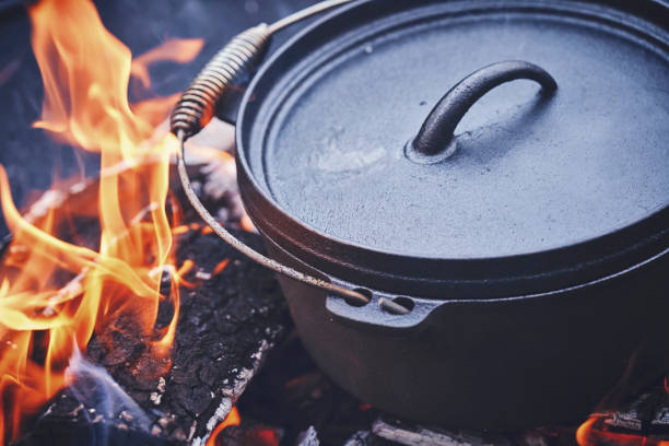 istock Cooking Chili Con Carne in Dutch Oven over Logfire 1026630752