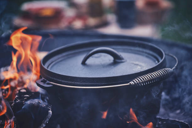istock Cooking Chili Con Carne in Dutch Oven over Logfire 1026630782