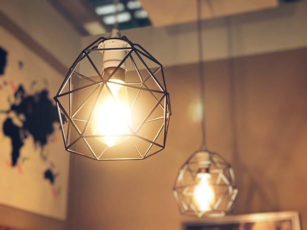 istock Light bulbs decoration in cafe shop, new ideas concept, thinking innovation, business solutions 1026631950