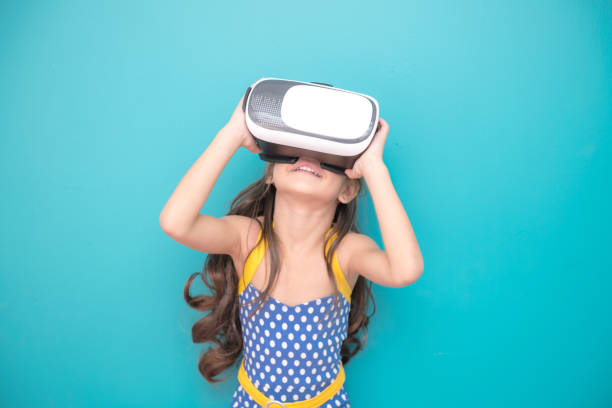 istock Young girl wearing VR headset. 1026636736