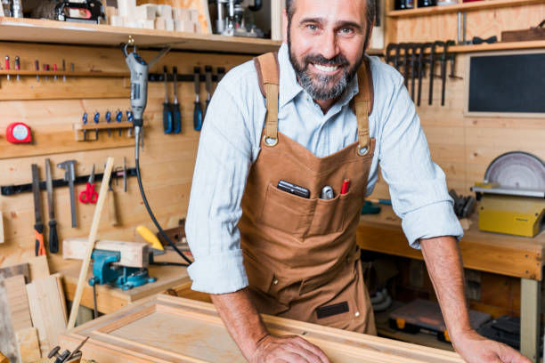 istock portrait of caucasian carpenter at work 1026641150