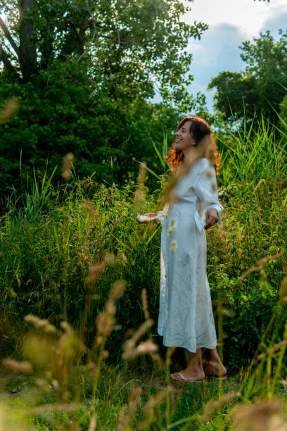 istock Lady in white night gown 1026653328