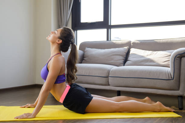 Woman during stretching workout at home