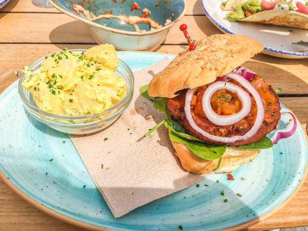 istock vegetarian lunch vegan burger and potatoes dish 1026693842