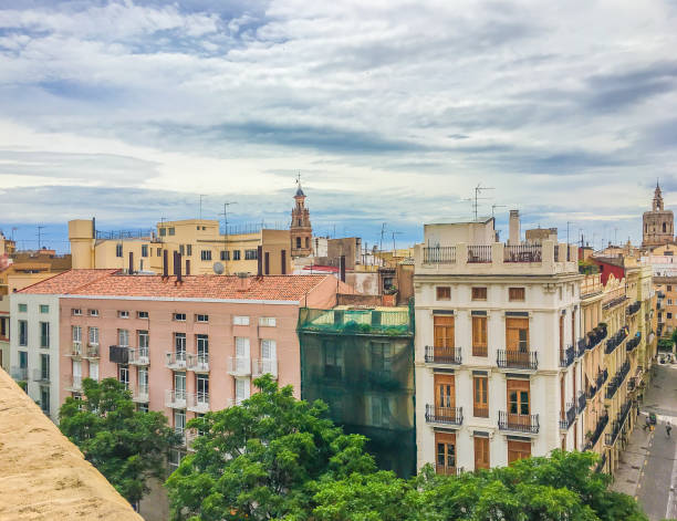 istock old style colorful spanish buildings with city view 1026694052