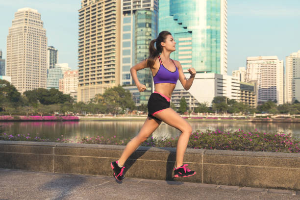 istock Woman in the city during her running workout 1026694246