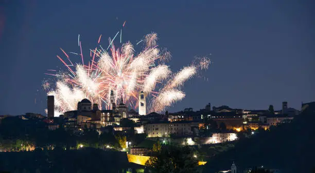 Bergamo skyline illuminated by fireworks