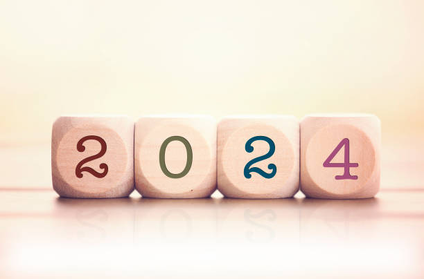 2024 written on cube wooden blocks.