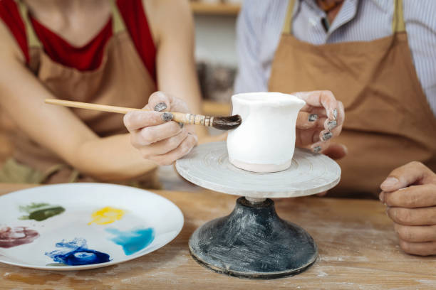 istock Couple of artists spending their weekend in workshop 1026704976
