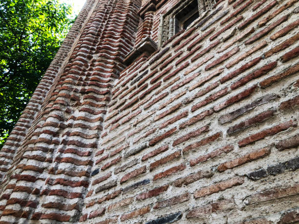istock A tall, beautiful brick building. Architecture. Yellow old stone 1026708946