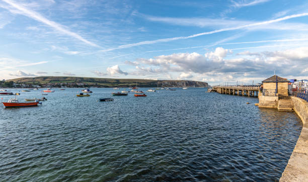 istock Small boats in Swanage Harbour in Dorset 1026709378