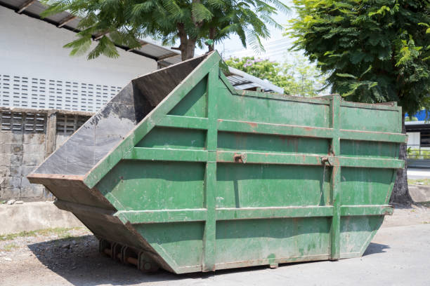 istock green industry dumpster on road 1026712884