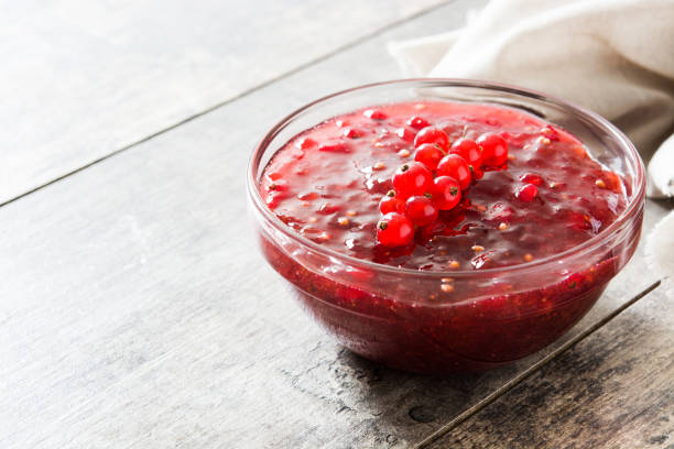 istock Cranberry sauce in bowl for Thanksgiving dinner 1026712964