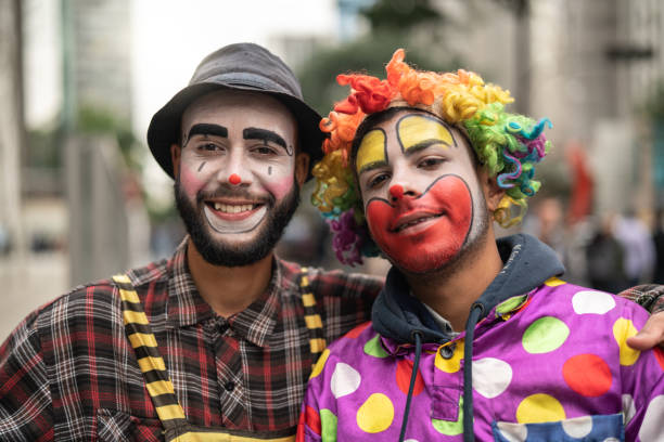 istock Two Funny Clown Portrait at City 1026713208