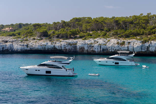 istock white yacht in a beautiful sea lagoon 1026717982