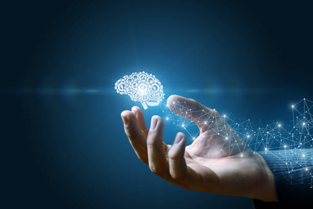 istock Brain of the gears shows a hand . 1026718956