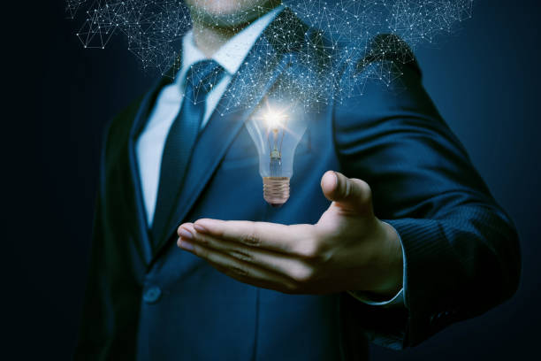 istock Bright idea in hand businessman . 1026718968