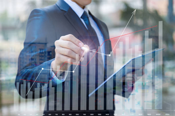 istock Businessman draws a graph of financial statistics . 1026719004