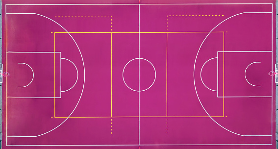 Aerial view strictly from above with the drone to a basketball court. Sport square for game in basketball. Top view.