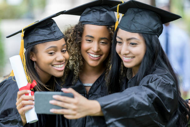 istock Female college friends taking selfie 1026754776