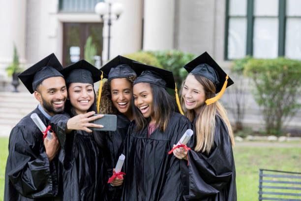 istock Cheerful group of college graduates 1026754780