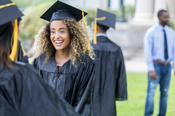 istock Excited female college graduate 1026754792