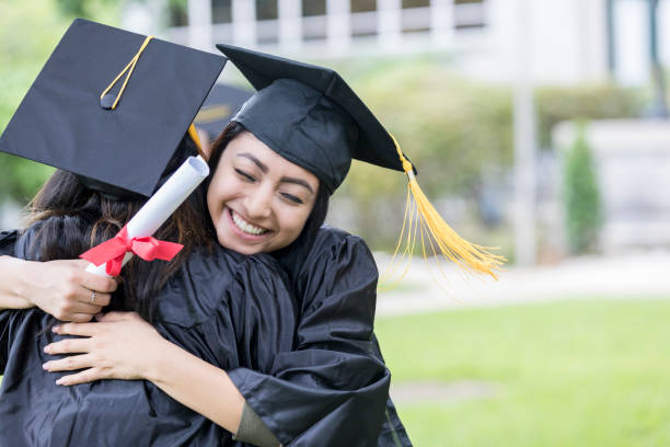 istock College friends embracing 1026754800