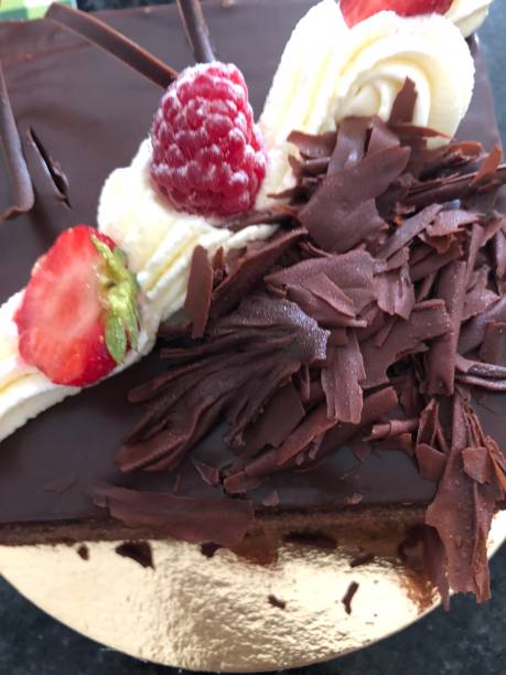 istock homemade cake with fresh cream and raspberries 1026760252
