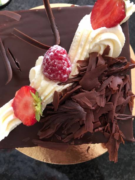 istock homemade cake with fresh cream and raspberries 1026760258
