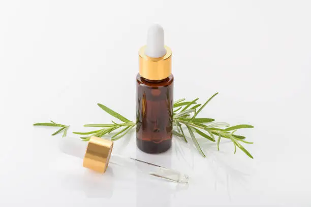 Rosemary essential oil clean style. Aromatherapy, spa, natural remedies