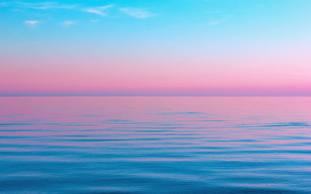 istock Abstract Calm Blue With Pink Seascape Background 1026766092