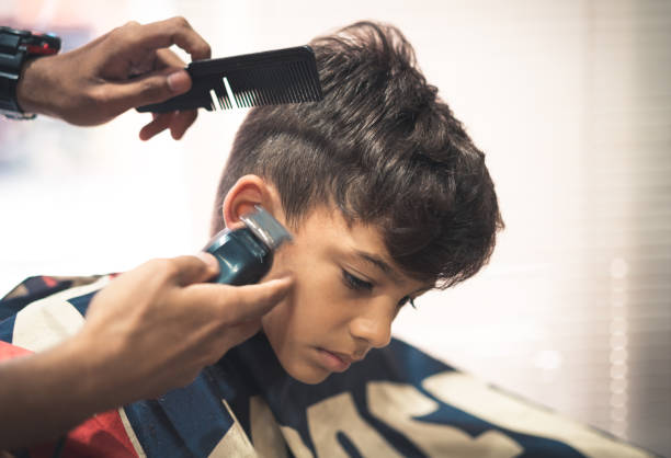 istock Cutting hair with electric razor 1026773860