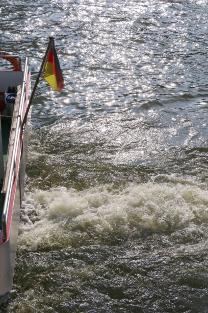 istock flag in a river cruise in Berlin 1026774014