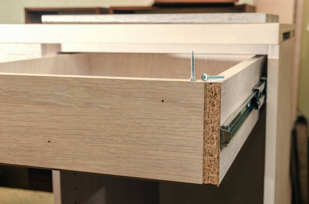 istock Assembling of furniture closeup 1026784360