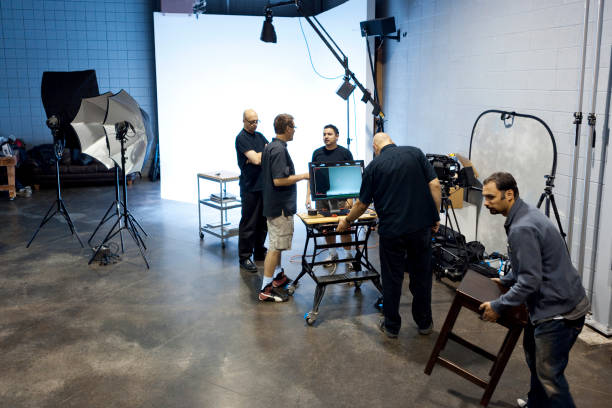 istock People Working Behind the Scenes on a Film Set 1026792026