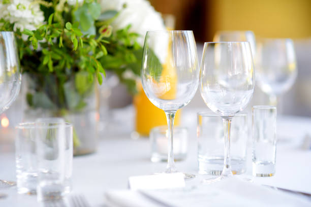 istock Beautiful table setting with crockery and flowers for a party, wedding reception or other festive event 1026796846