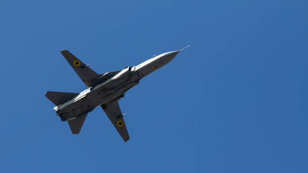 istock fighter flies against the blue sky, military aircraft 1026799400