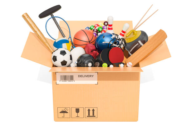 istock Sports game equipment inside cardboard box, delivery concept. 3D rendering isolated on white background 1026799624