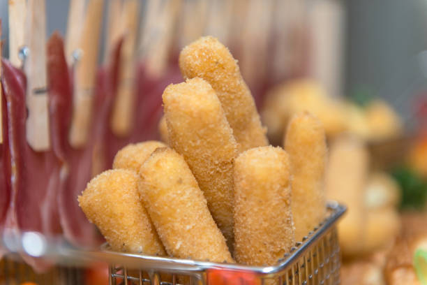 Fried cheese in metal basket served